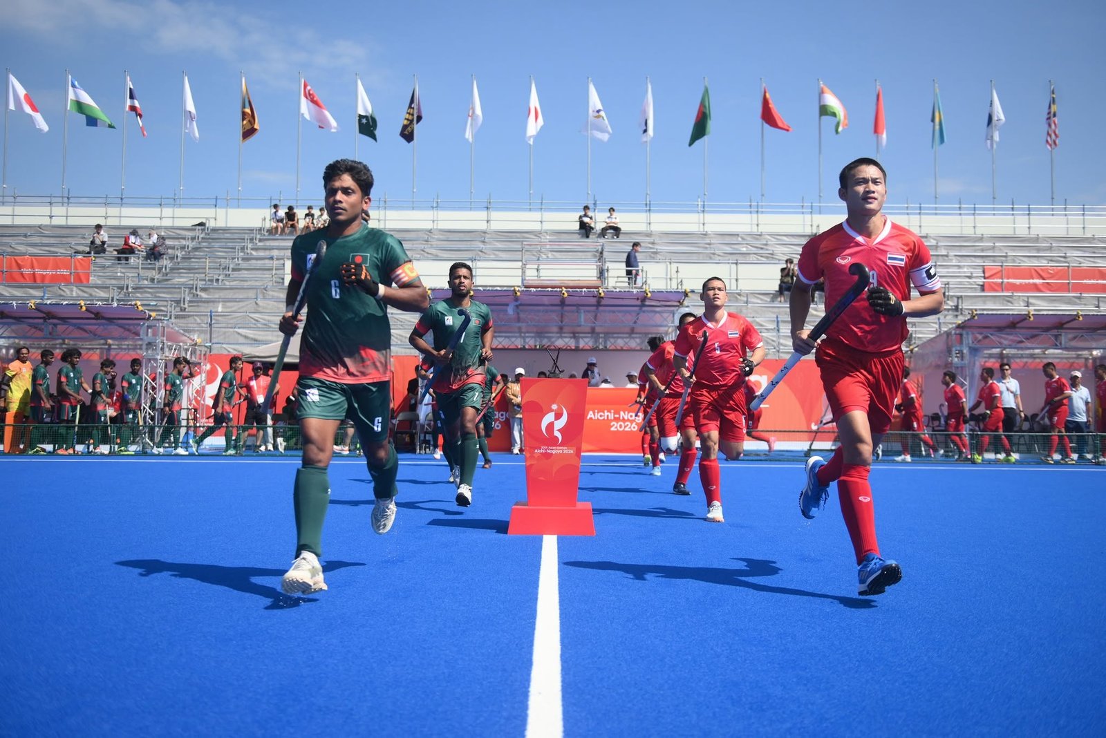 Bangladesh and Thailand teams enter the pitch at the Asian Games 2026